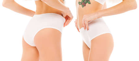 Young beautiful girl in sports underwear isolated on white backgroundの写真素材