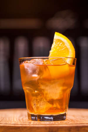 Alcoholic cocktail on wooden boardの写真素材