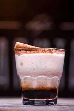 Alcoholic cocktail on wooden boardの写真素材