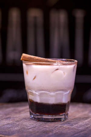 Alcoholic cocktail on wooden boardの写真素材