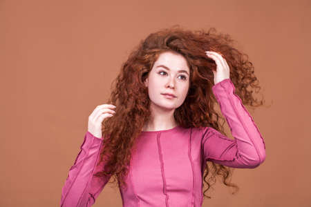 Close up portrait of a young beautiful red hair girl