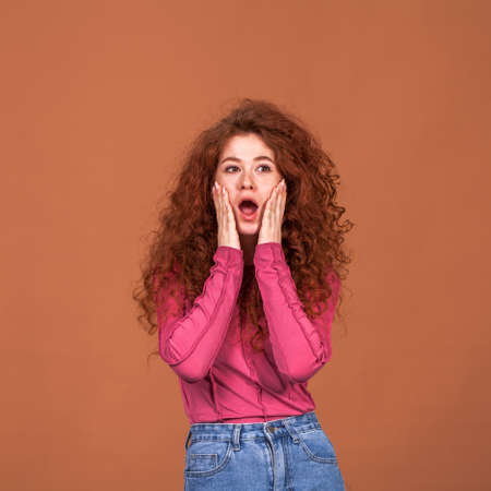 Close up portrait of a young beautiful red hair girl
