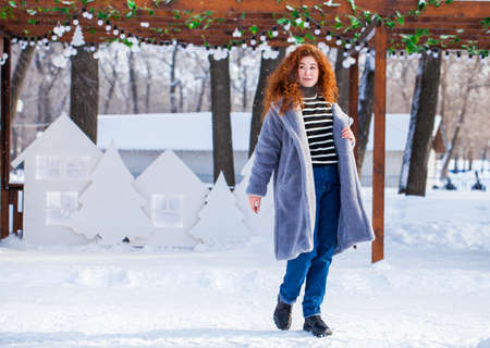 Hair beauty. Portrait of a young beautiful red hair womanの写真素材