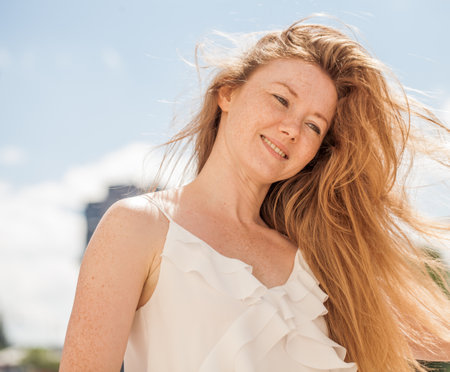 Close up portrait of a young beautiful red hair womanの写真素材