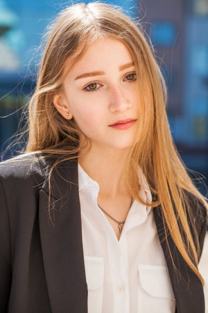 portrait of a young blonde model in wheat fieldの写真素材