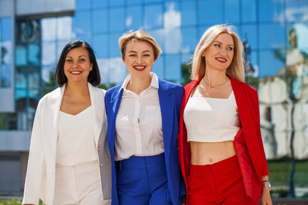 Full length portrait of four business women outdoorsの写真素材