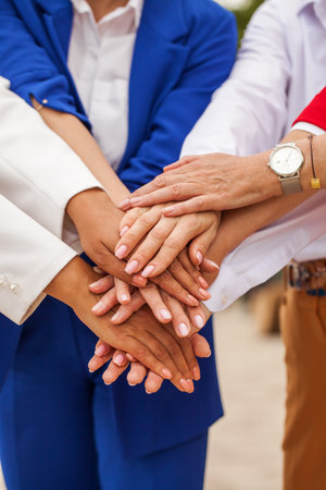 Full length portrait of four business women outdoors