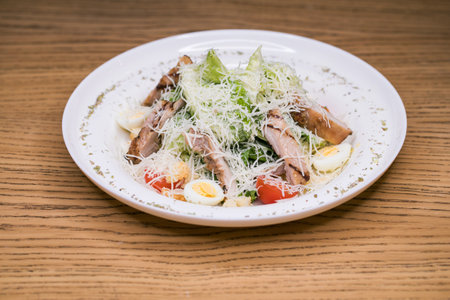 Restaurant dish - caesar salad with fried chickenの写真素材