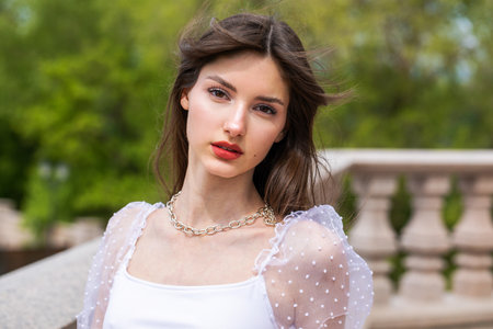 Close up portrait of a young beautiful woman, summer outdoorの写真素材