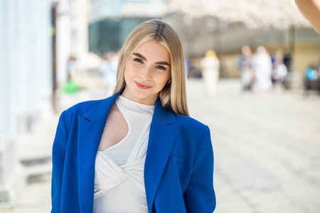 Close-up portrait of a young beautiful blonde girlの写真素材