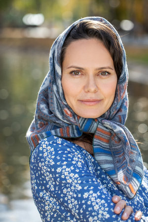 Russian beauty - young beautiful girl in a traditional headscarfの写真素材