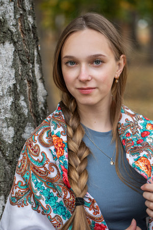 Russian beauty - young beautiful girl in a traditional headscarfの写真素材
