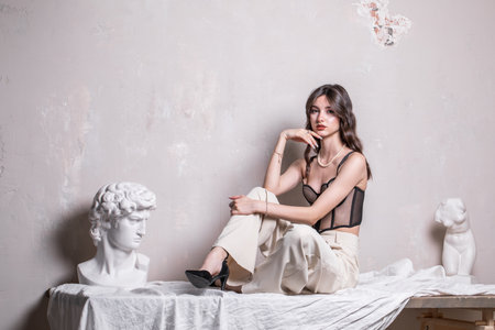 Portrait of a young brunette girl in the studioの写真素材