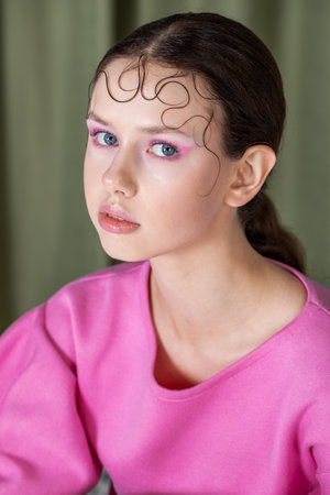 Beauty hair style. Close up portrait of a young beautiful girlの写真素材