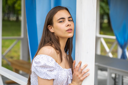 Portrait of a young beautiful brunette womanの写真素材