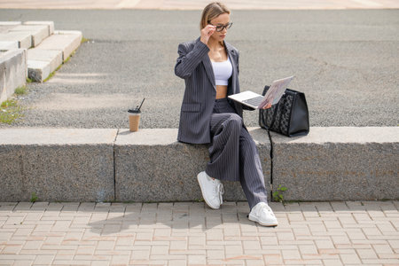 Business woman, portrait of a girl in a pantsuitの写真素材