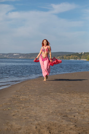 Portrait of a red-haired woman in an dance costumeの写真素材