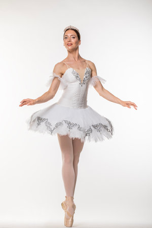 Studio portrait of a ballerina in a white tutuの写真素材