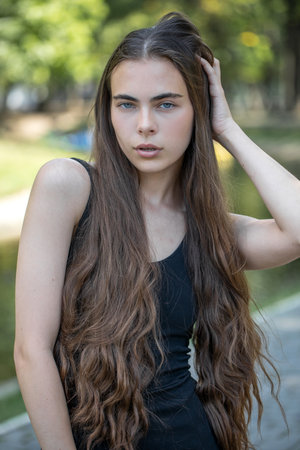 Close up portrait of a young beautiful brunette girlの写真素材