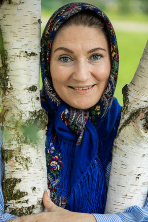 Portrait of a middle-aged woman in a headscarf