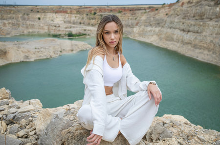 Full length portrait of young beautiful woman posingの写真素材