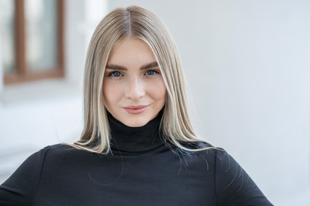 Close up portrait of a young attractive blonde womanの写真素材