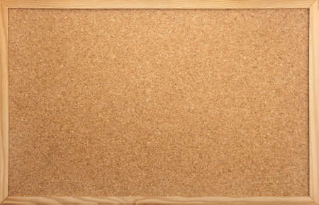 empty notice-board made of cork as backdropの写真素材