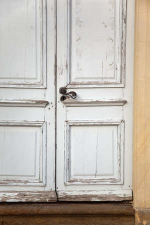 antique old white wooden manor gate backdropの写真素材