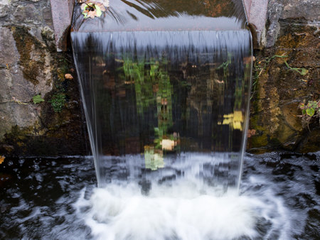 A small waterfall in the park for rest and relaxation after a hard dayのeditorial素材