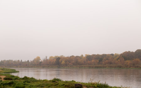 Bright colors of autumn on a calm river