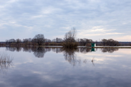 River overflow, spring flood after a snowy winterの写真素材