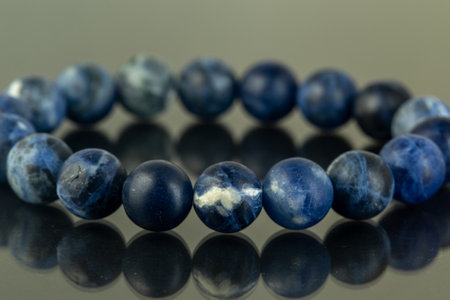 Natural stone jewelry bracelets. Handmade bead bracelet, bracelet made of stone round, studio quality, agate, lavaの写真素材