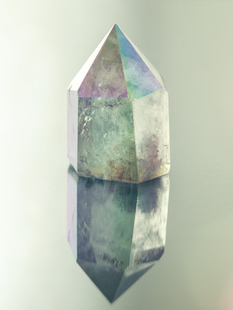 Closeup picture of quartz mineral gemstone isolated on a gray backgroundの写真素材