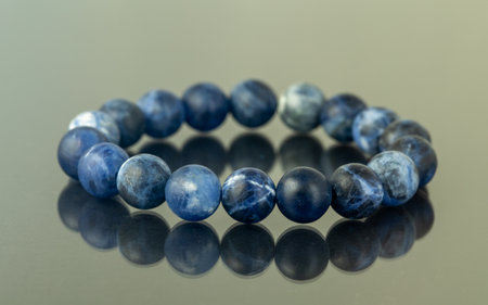Natural stone jewelry bracelets. Handmade bead bracelet, bracelet made of stone round, studio quality, agate, lavaの写真素材