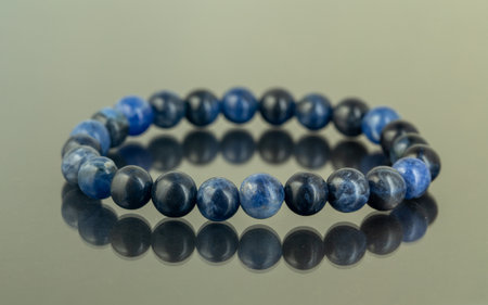 Natural stone jewelry bracelets. Handmade bead bracelet, bracelet made of stone round, studio quality, agate, lavaの写真素材