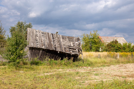 Wooden old barrack-type house, old housingの写真素材