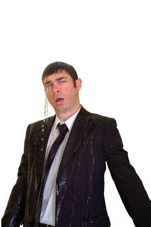 Business man isolated with copy space showing water raining and splashing over him の写真素材