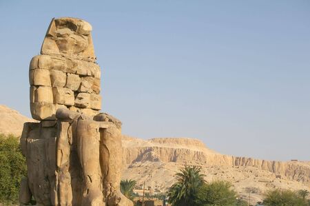 colossus of memnon  in the valley of the kings overlooking Thebes の写真素材