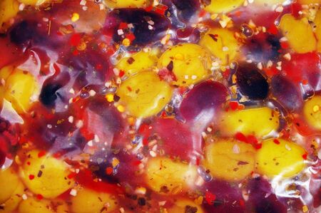 kalamata olives in plastic food preserving bagの写真素材