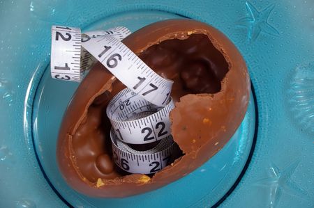 easter egg with tape showing diet concernsの写真素材