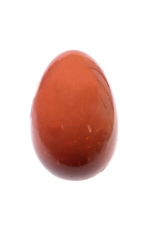 shiny brown easter egg isolated on whiteの写真素材