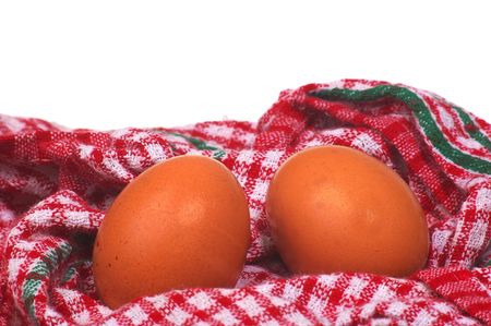 two boiled eggs in table cloth tea towelの写真素材