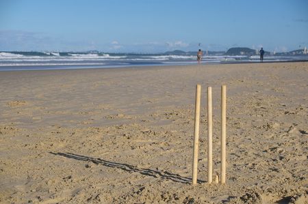 he great Australian tradition of beach cricket on the iconic goldcoastの写真素材