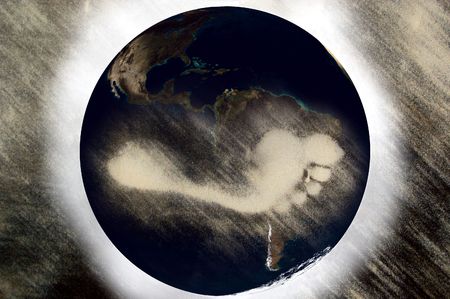 Carbon footprint on planet earth drawing conceptの写真素材