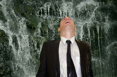 business man concept image back to nature  waterfall cleanseの写真素材