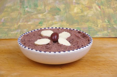 kalamata olive dip with bocconcini cheese garnishの写真素材