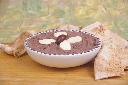 kalamata olive dip with bocconcini cheese garnishの写真素材