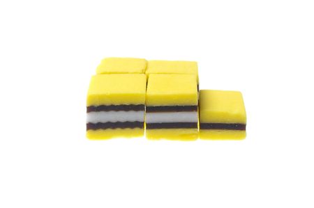 yellow and black plus white licorice over whiteのeditorial素材