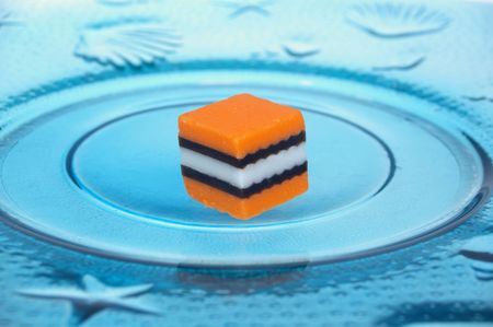 pink white and black licorice on plateのeditorial素材