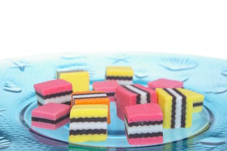 orange pink and yellow licorice on plateのeditorial素材